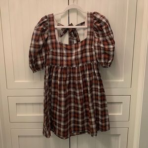 SHOP NEIGHBOR babydoll dress with puff sleeves. Black, cream, burnt orange plaid